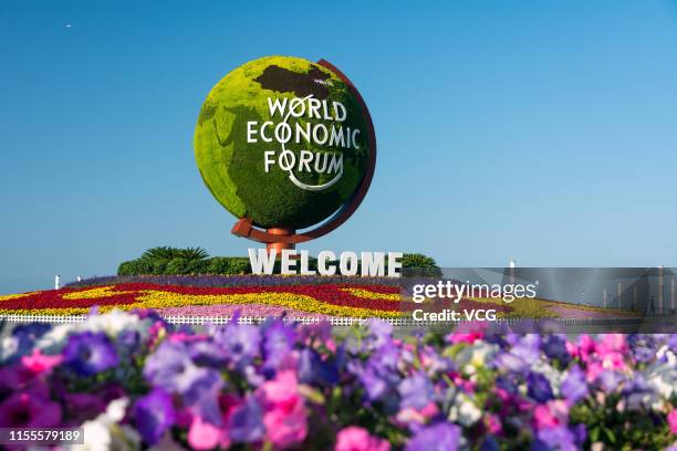 Flower parterre with the logo reading 'World Economic Forum' is seen ahead of the World Economic Forum Annual Meeting of the New Champions 2019 at...