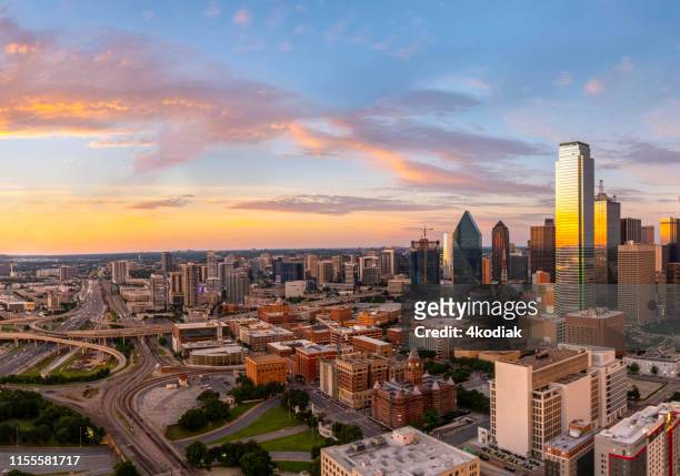 dallas texas evening skyline - texas stock pictures, royalty-free photos & images