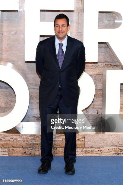 Adam Sandler poses for photos on the red carpet before 'Murder Mystery' premiere at Antara Polanco Fashion Hall on June 12, 2019 in Mexico City,...