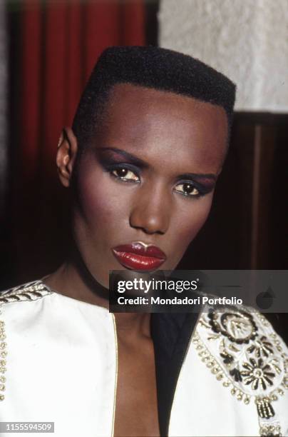 Jamaican singer Grace Jones posing for a photoshoot. Italy, 1981