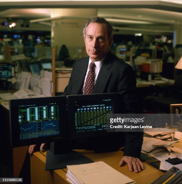 Businessman Michael Bloomberg sits at his desk with a pair of Bloomberg Terminals on October 31, 1997 in New York City, New York.