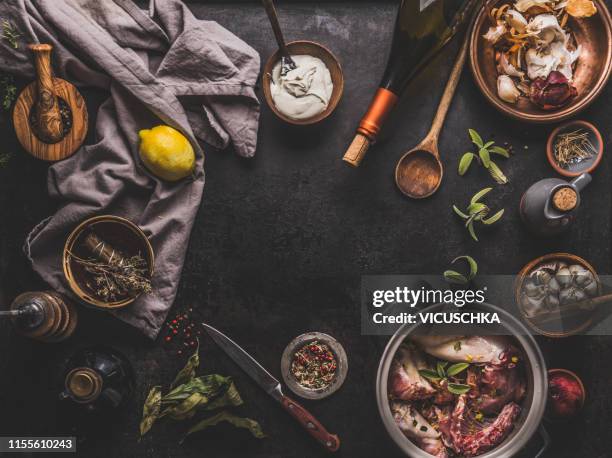 food background with ingredients for wildfowl ragout or stew, frame - wein und kochen stock-fotos und bilder