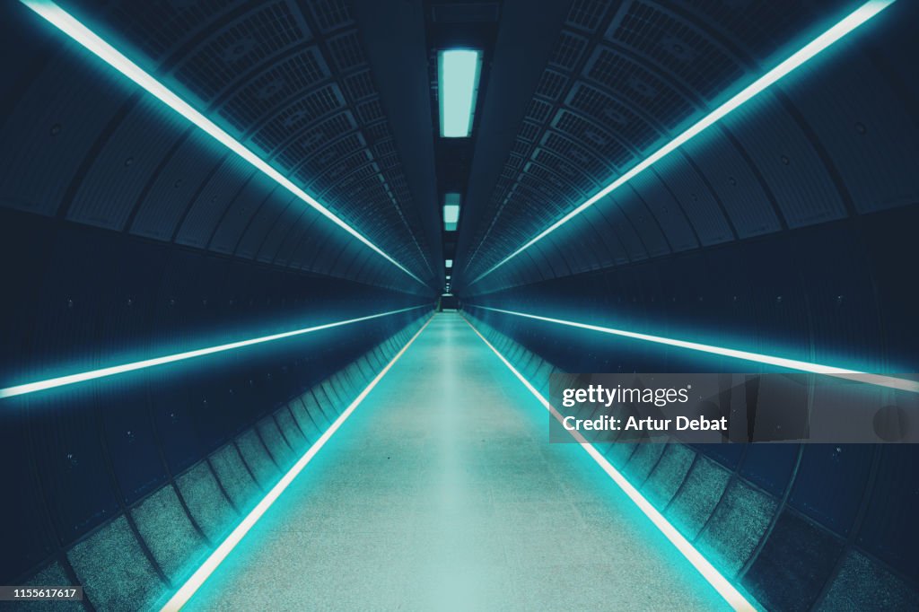 Cool underground tunnel with nice vanishing point and neon lights.