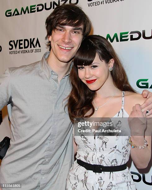 Marston Hefner and girlfriend Playboy Playmate of the year Claire Sinclair arrive at the E3 red carpet launch party at Suede in the Westin...