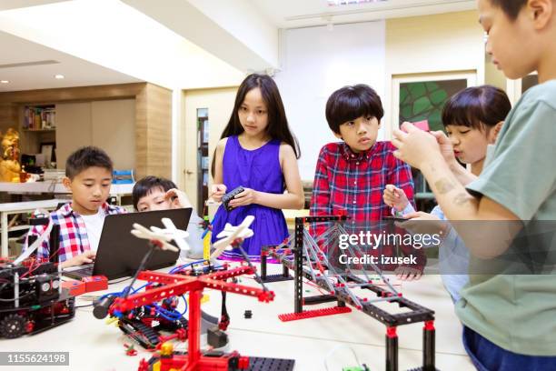 students making project together in stem class - kid coding stock pictures, royalty-free photos & images