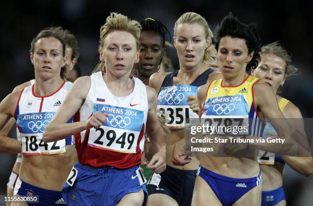 Jerry Holt/Star Tribune Athens Greece 8/24/2004 women√ïs 1500m-----Carrie Tollefson flanked left to right Hayley Tullett , Tatyana Tomashova and...