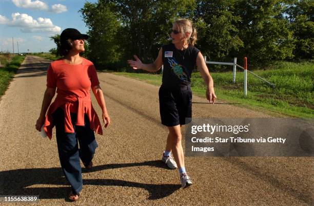 Camp Casey,Texas,Thurs.,Aug. 18, 2005-- Minnesota Sen. Becky Lourey and Colleen Rowley arrived late for the march so they walked on the road leading...