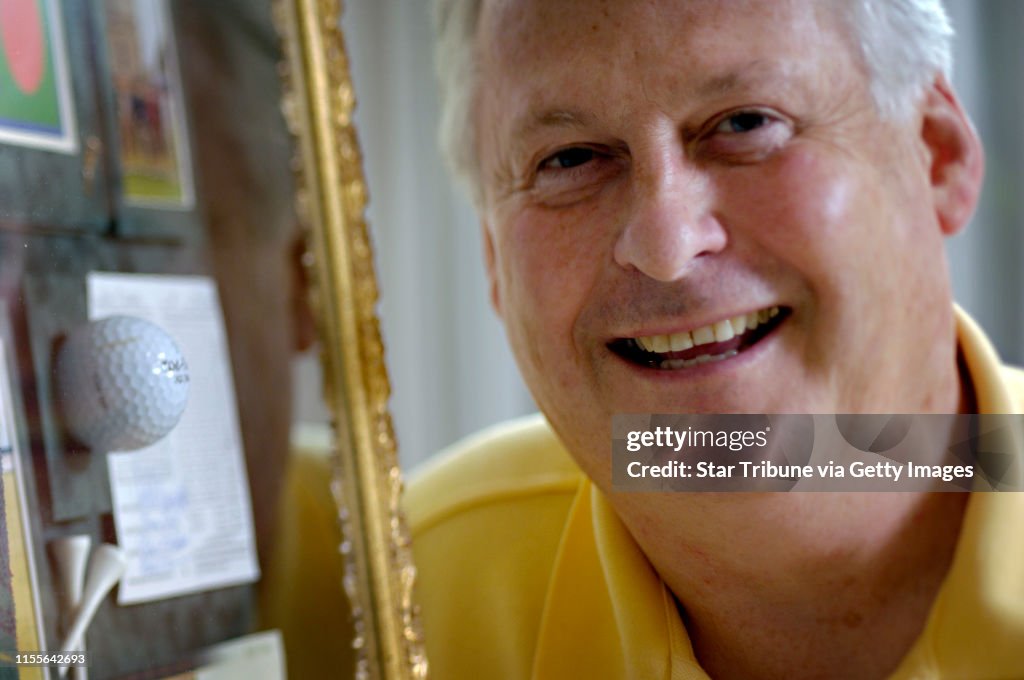 David Brewster/StarTribune Wednesday_07/06/05_MapleGrove - - - - - - - Hole-in-one-er, Tom O'Leary with "the" ball (left) and score card (among other momentos from that day, all in a shadow box put together by a friend) from Scotland's St.Andrews golf coa