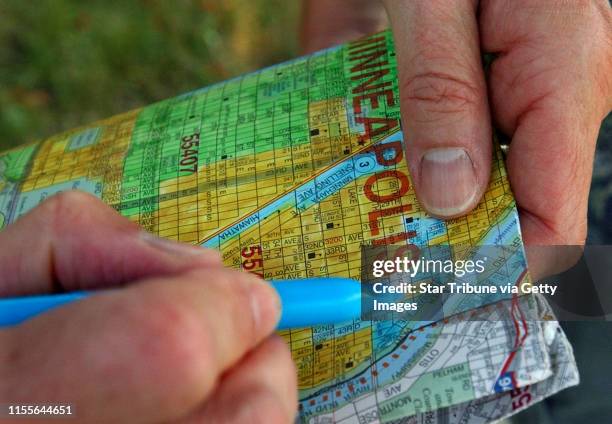 Joey McLeister/Star Tribune Minneapolis,Mn.,Sunday,July 10, 2005--Francine Corcoran of Minneapolis colors in the final portion of her Minneapolis map...