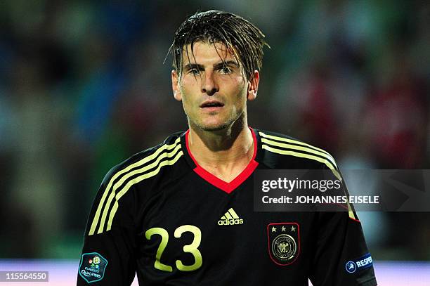 Germany's striker Mario Gomez reacts during the Euro 2012 qualifier football match Azerbaijan vs Germany on June 7, 2011 in Baku, Azerbaijan. Germany...