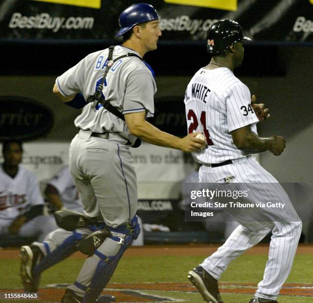 Mlevison@startribune.com 05/03/06 - Assign#102234- Twins vs. Kansas City. IN THIS PHOTO: Twin Rondell White is tagged out on the third base line by...