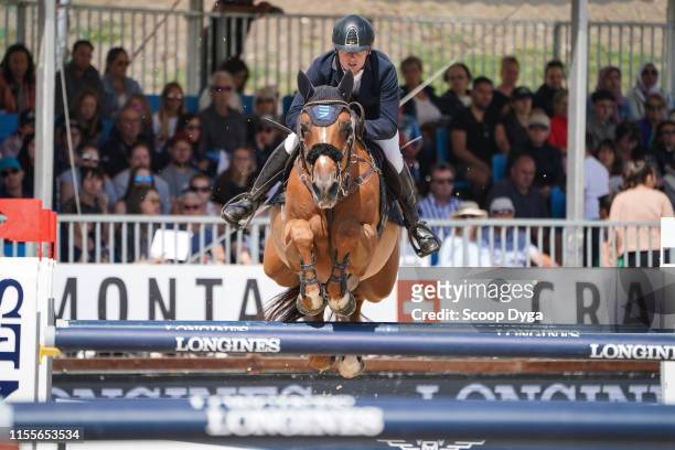 Cyril Bouvard OF FRANCE riding Victoria d'Argent during the Jumping Longines Crans Montana at Crans-sur-Sierre on July 14, 2019 in Crans-Montana,...
