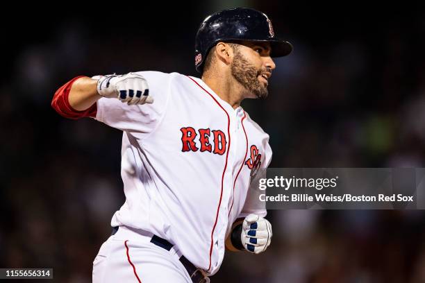 Martinez of the Boston Red Sox reacts after hitting a game tying solo home run during the eighth inning of a game against the Los Angeles Dodgers on...