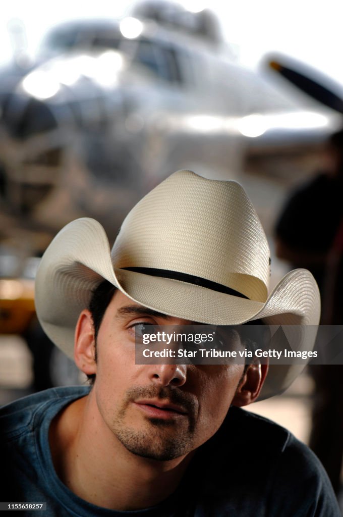 DAVID BREWSTER • dbrewster@startribune.com Monday_6/11/07_SouthSt.Paul Brad Paisley interviewed after a concert event at the CAF hangar at Flemming Field in South St.Paul. (That's the CAFs B-25 Mitchell in background.)