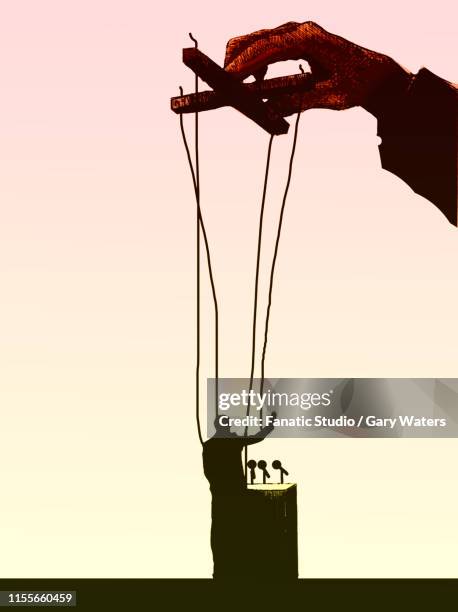 ilustraciones, imágenes clip art, dibujos animados e iconos de stock de concept image of a hand of businessman manipulating puppet politician depicting control by big business - puppet