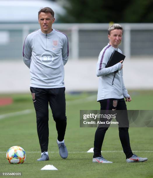 Head coach Phil Neville and asisstant coach Bev Priestman look on during an England training session during the 2019 FIFA Women's World Cup France at...