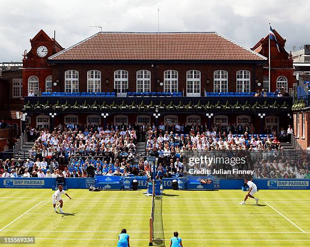 General view of centre court as Arnaud Clement of France runs for the return shot during his Men's Singles second round match against Marin Cilic of...