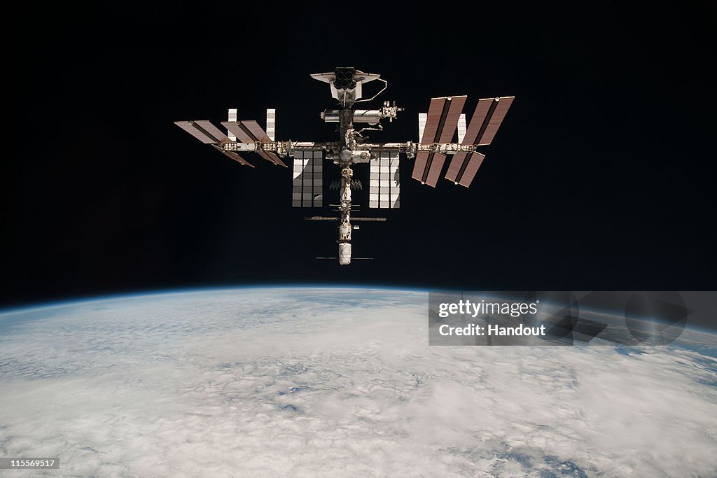 Endeavour Orbits Earth Docked To International Space Station