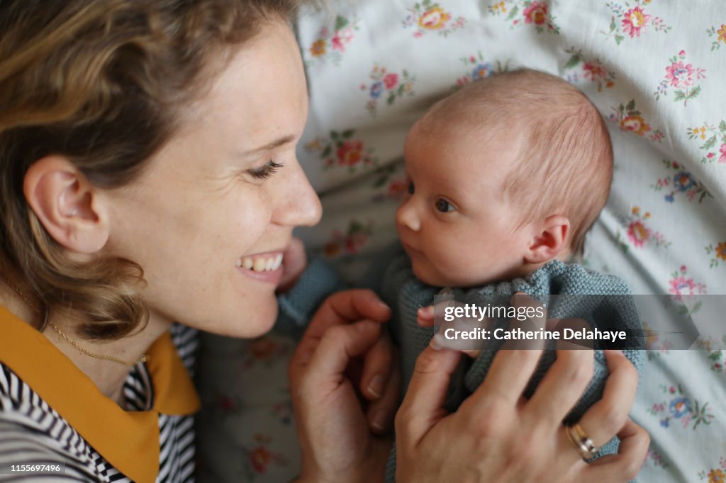 A new born baby girl and her mum