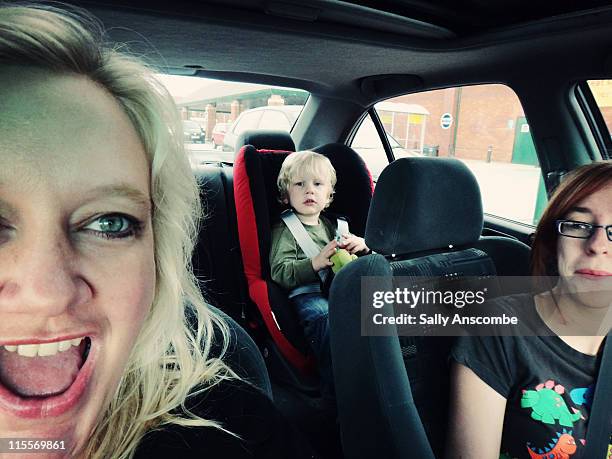 mother and children in car - daughter car stock pictures, royalty-free photos & images