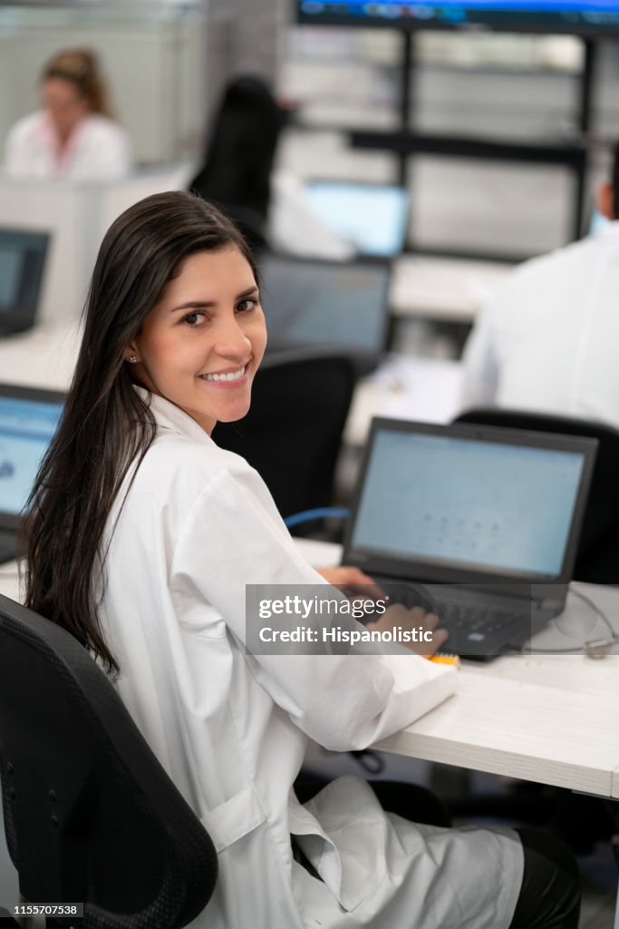 Learning Lab Lady Beautiful Female Student At A Computer Lab Wearing A Lab Coat Smiling ...