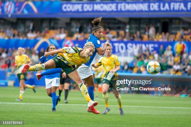 June 13. Cristiane of Brazil scores her sides second goal with a powerful header while defended by Steph Catley of Australia during the Australia V...