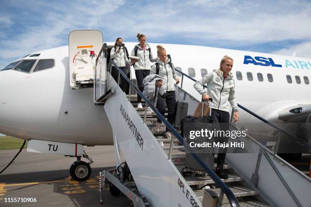 Merle Frohms , Leonie Maier, Alexandra Popp and Laura Benkarth of Germany arrive to the airport on June 13, 2019 in Montpellier, France.