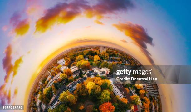 sunset clouds over bonn in autumn - little planet effect stock pictures, royalty-free photos & images