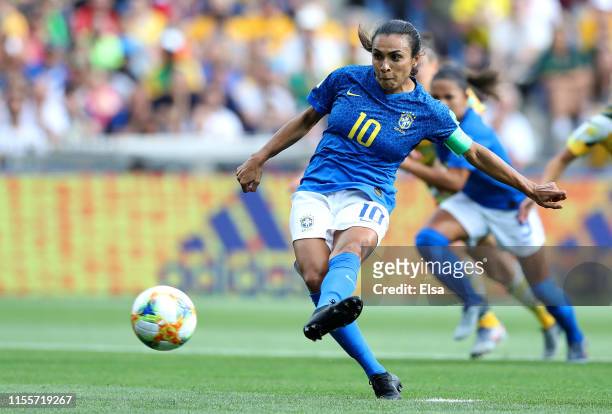 Marta of Brazil scores a penalty for her team's first goal during the 2019 FIFA Women's World Cup France group C match between Australia and Brazil...