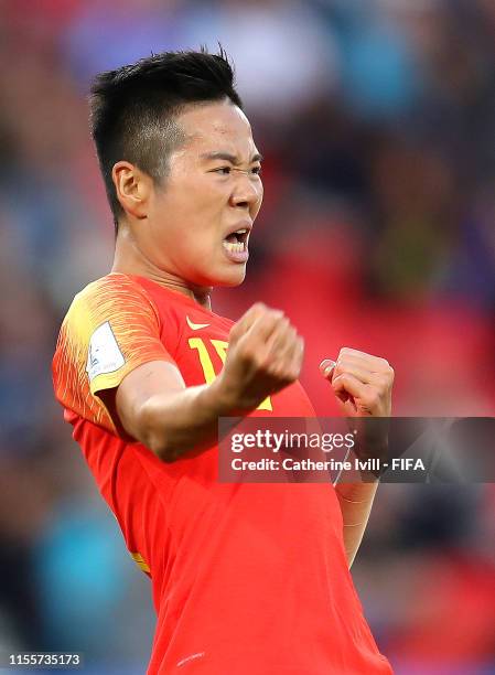 Ying Li of China celebrates after scoring her team's first goal during the 2019 FIFA Women's World Cup France group B match between South Africa and...