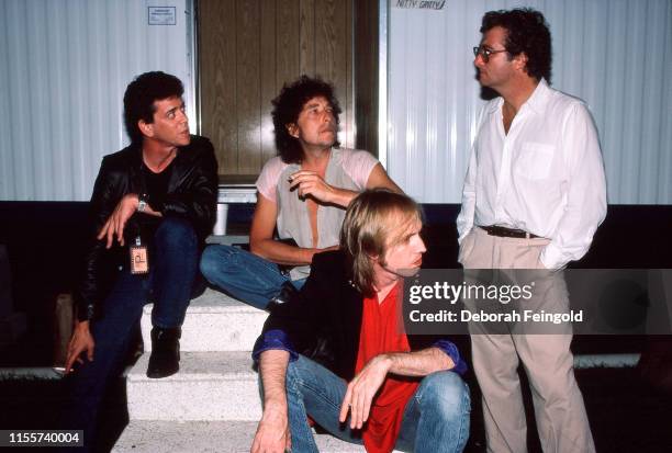 Deborah Feingold/Corbis via Getty Images) NEW YORK Bob Dylan, Tom Petty, Lou Reed and Randy Newman pose for a portrait at first Farm Aid September...