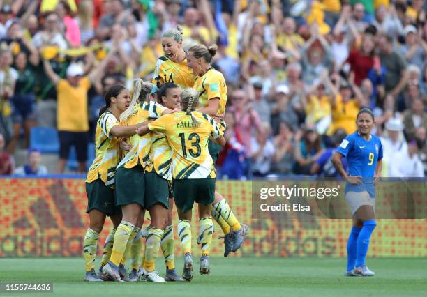 Chloe Logarzo of Australia celebrates with teammates after scoring her team's second goal during the 2019 FIFA Women's World Cup France group C match...