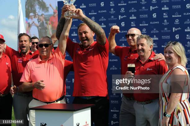 Newport, Wales 14th July Victorious members of the Wales team of Scott Quinell, Tom Shanklin and Jonathan Davies celebrate with the trophy during the...