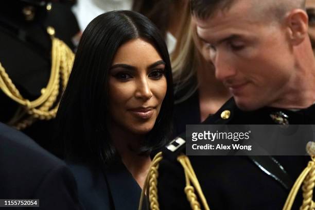 Kim Kardashian West leaves after an East Room event on “second chance hiring” June 13, 2019 at the White House in Washington, DC. President Donald...