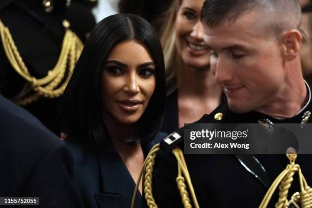 Kim Kardashian West leaves after an East Room event on “second chance hiring” June 13, 2019 at the White House in Washington, DC. President Donald...