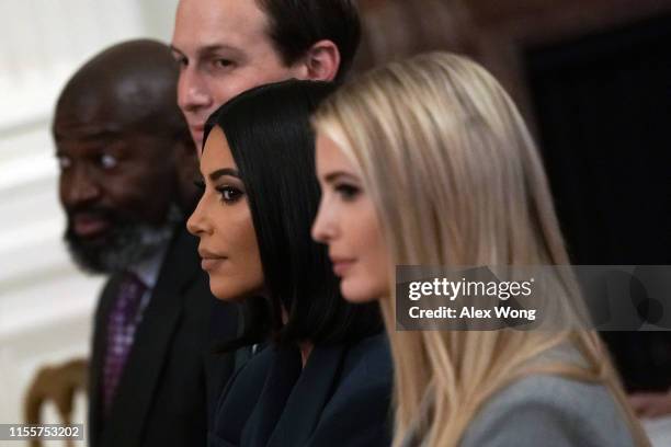 Kim Kardashian West sits with Ivanka Trump and Jared Kushner during an East Room event on “second chance hiring” June 13, 2019 at the White House in...