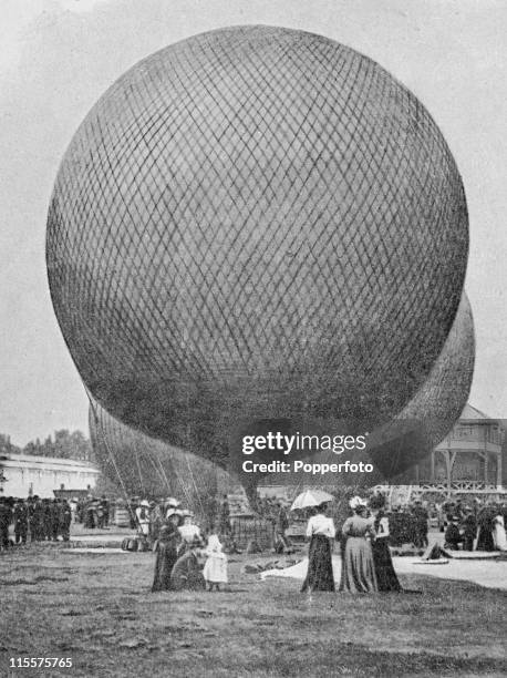 The Olympic Games were held during the Great Exposition in Paris, 1900. This images shows spectators looking at the hotair balloons in the park at...