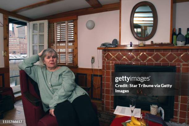 Patricia relaxes in her cabin in front of a fire. The downtown skyline is seen through the door behind her. GENERAL INFORMATION: Duane Braley/Star...