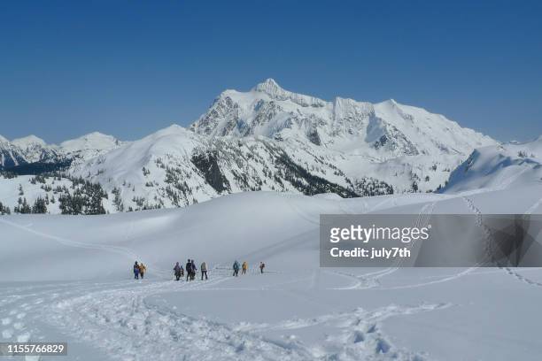 snowshoeng artist point with mount shuksan - mt baker stock pictures, royalty-free photos & images