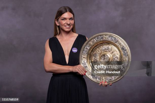 In this handout image supplied by the All England Lawn Tennis Club, Simona Halep of Romania, the Ladies Singles champion photographed at the...