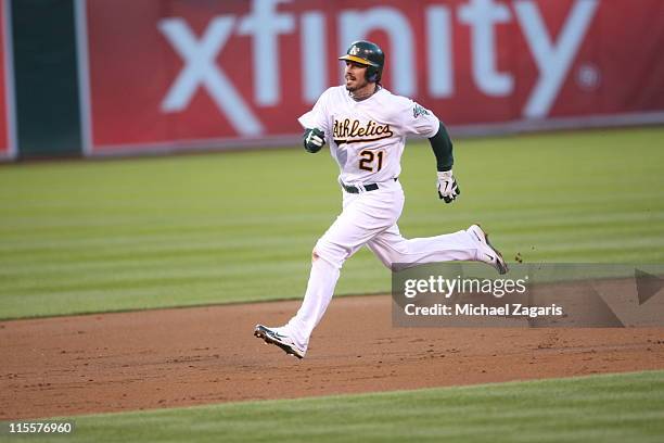 Andy LaRoche of the Oakland Athletics runs bases during the game against the New York Yankees at the Oakland-Alameda County Coliseum on May 31, 2011...