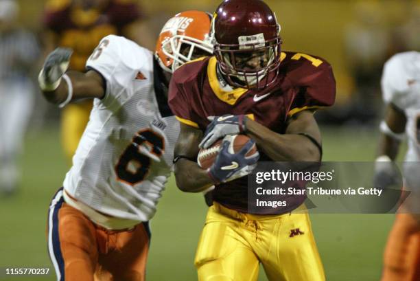 Marlin Levison - Strib 10/23/04 - Assign - UM Gophers vs. Illinois football. Gophers win 45-0 . First shutout defensively since 1990. IN THIS PHOTO:...