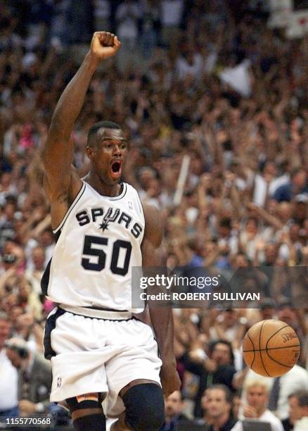 David Robinson of the San Antonio Spurs celebrates his team's victory over the Portland Trail Blazers after game two of the NBA Western Conference...