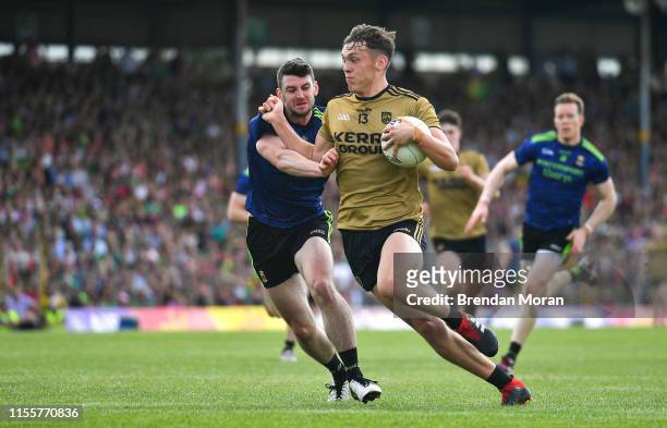 Kerry , Ireland - 14 July 2019; David Clifford of Kerry is tackled by Brendan Harrison of Mayo during the GAA Football All-Ireland Senior...