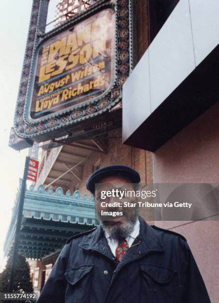 Playwright and writer August Wilson is shown outside the Broadway theater in New York City when his play "The Piano Lesson" was playing in June 1990....