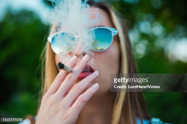 smoking marijuana - smoking issues stock pictures, royalty-free photos & images