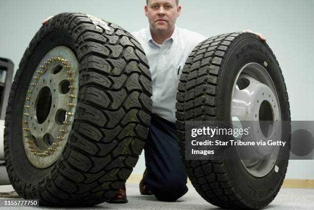 Sgreener@startribune.com Stillwater, MN. 2/2/2006--Mojave Labs COO Erik Crawford with OEM tires that don't meet demanding requirements for extreme...