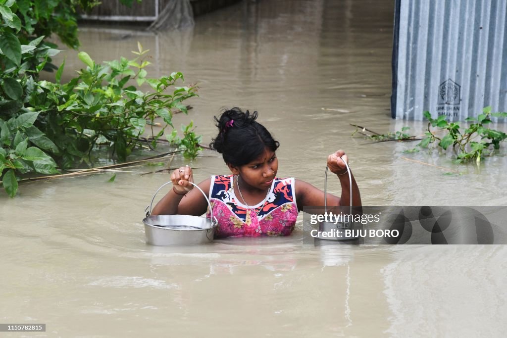 TOPSHOT-INDIA-WEATHER-FLOOD