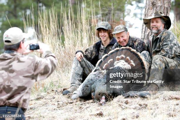 Jolyon Stein, center, of the Twin Cities, and his 14-year-old grandson, Mark Radosevich, left, shared a laugh with their guide, Bruce "Breeze"...