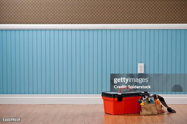 toolbox &amp; toolbelt in empty room - wainscoting stock pictures, royalty-free photos & images